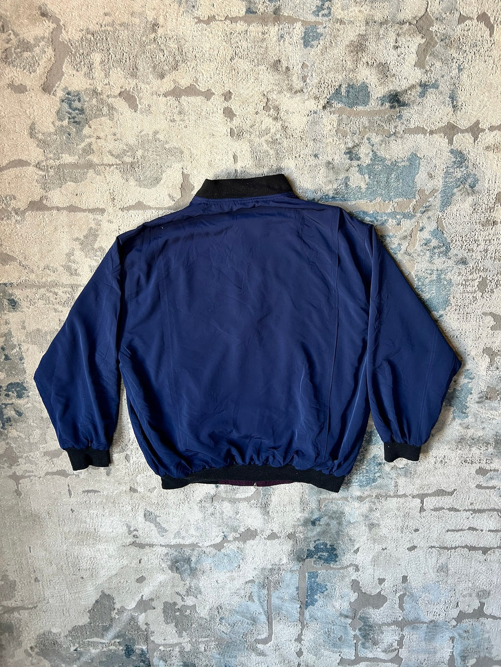 Blue windbreaker jacket