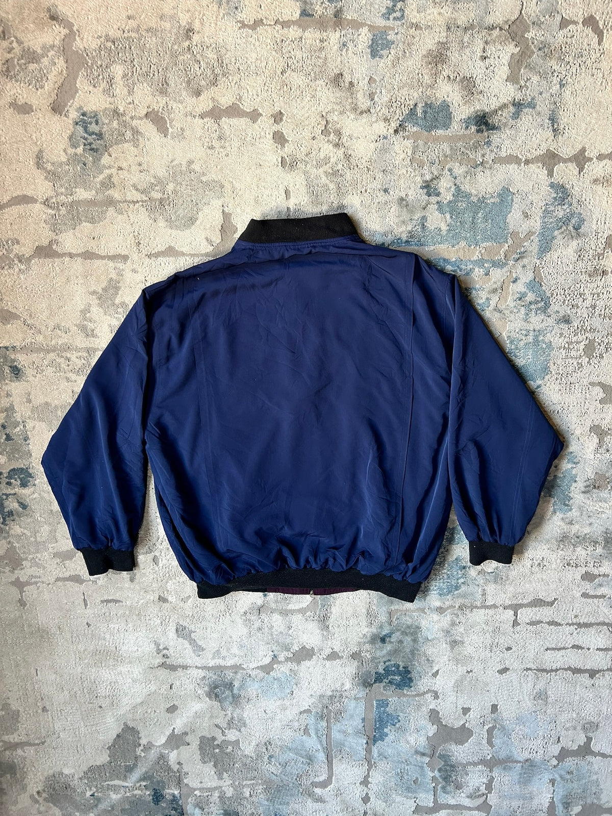 Blue windbreaker jacket