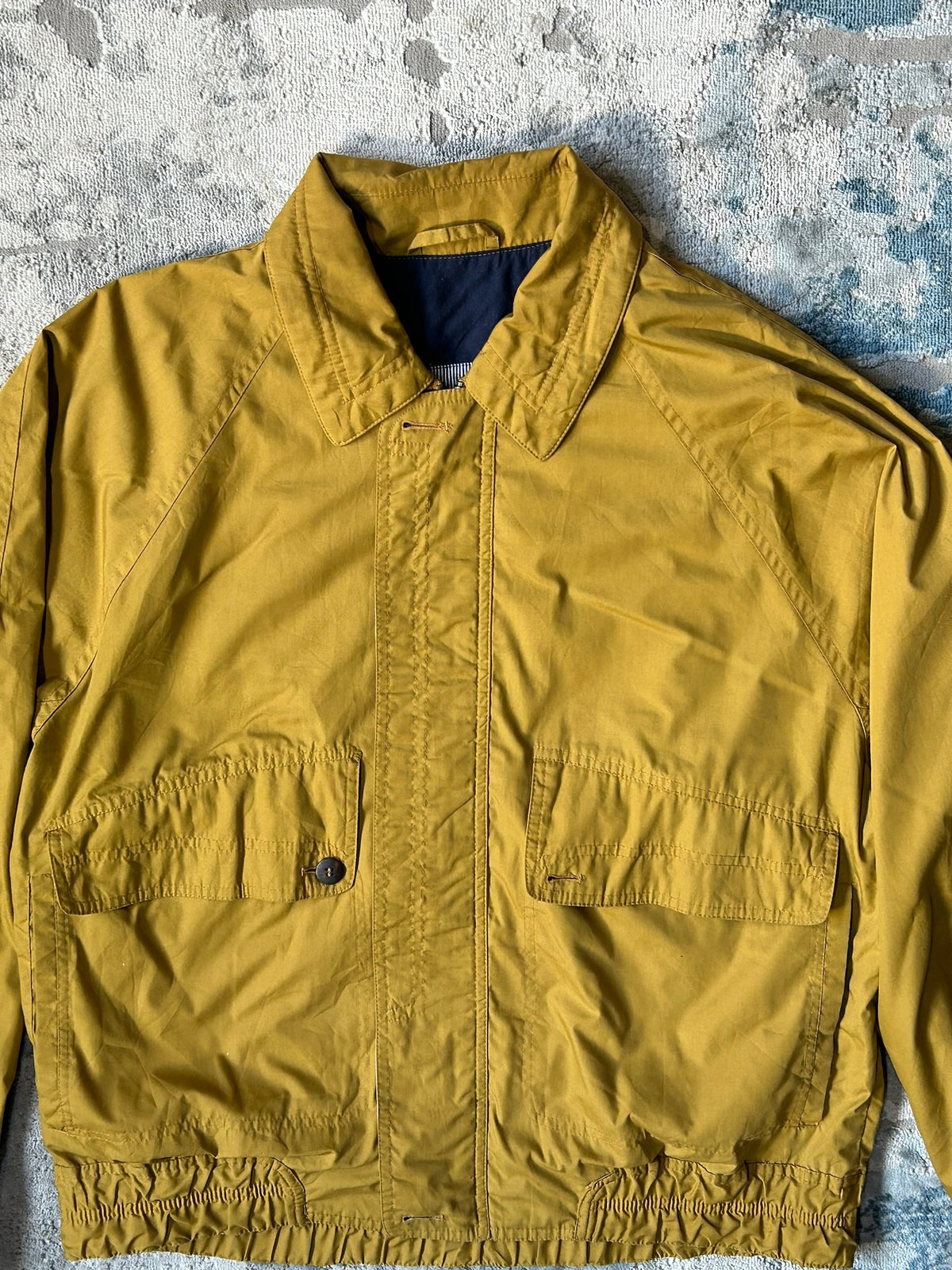 Mustard windbreaker jacket