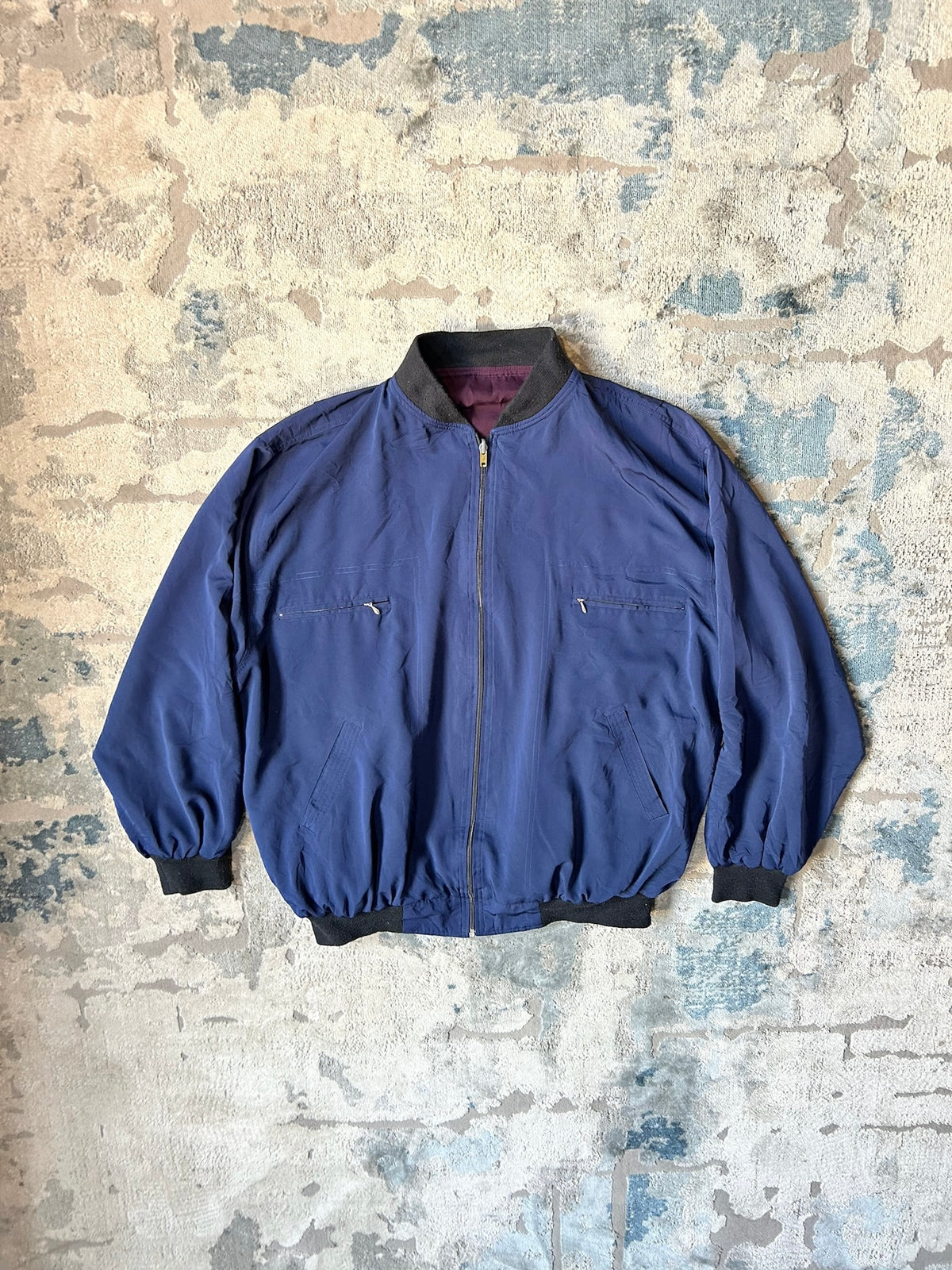 Blue windbreaker jacket