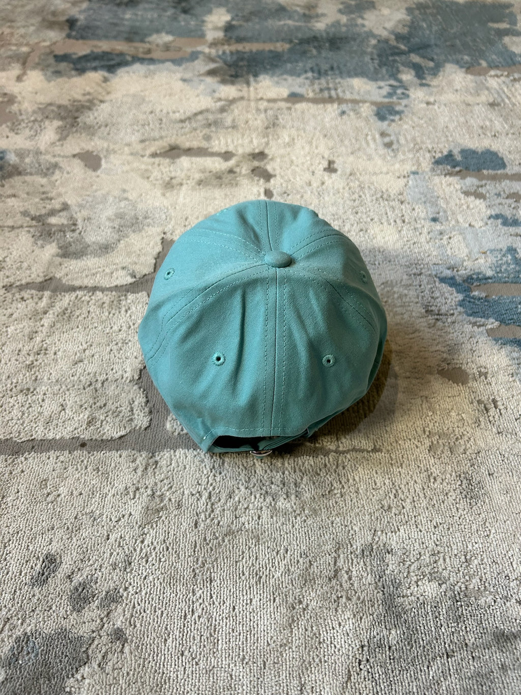 Turquoise baseball cap