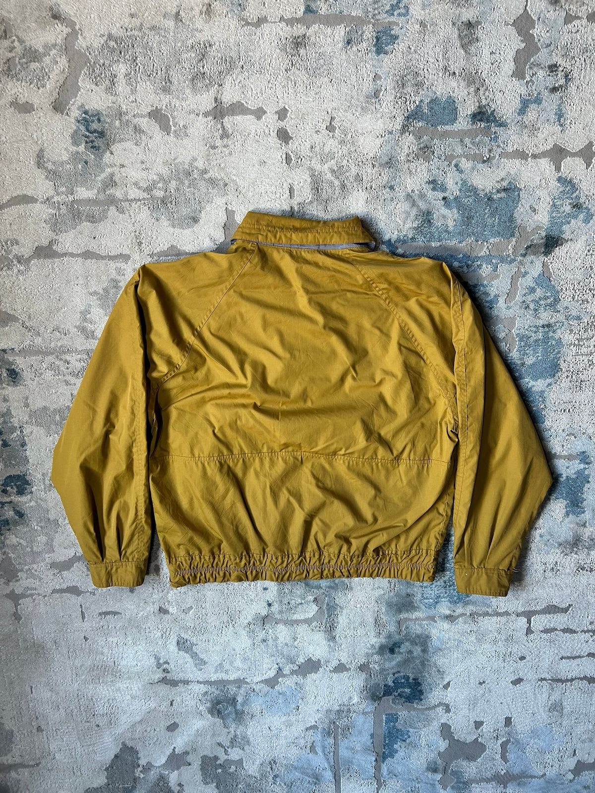 Mustard windbreaker jacket