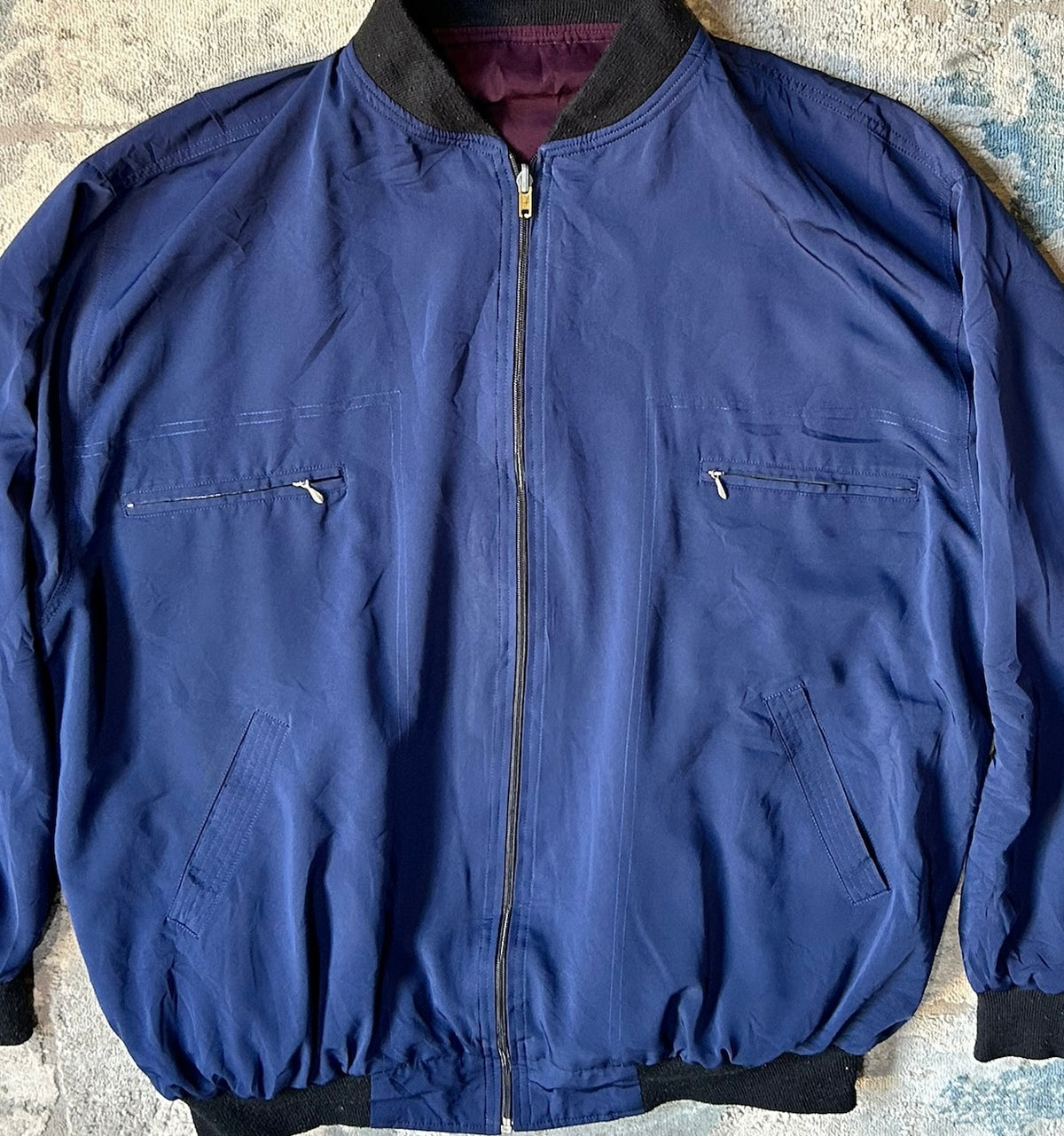 Blue windbreaker jacket