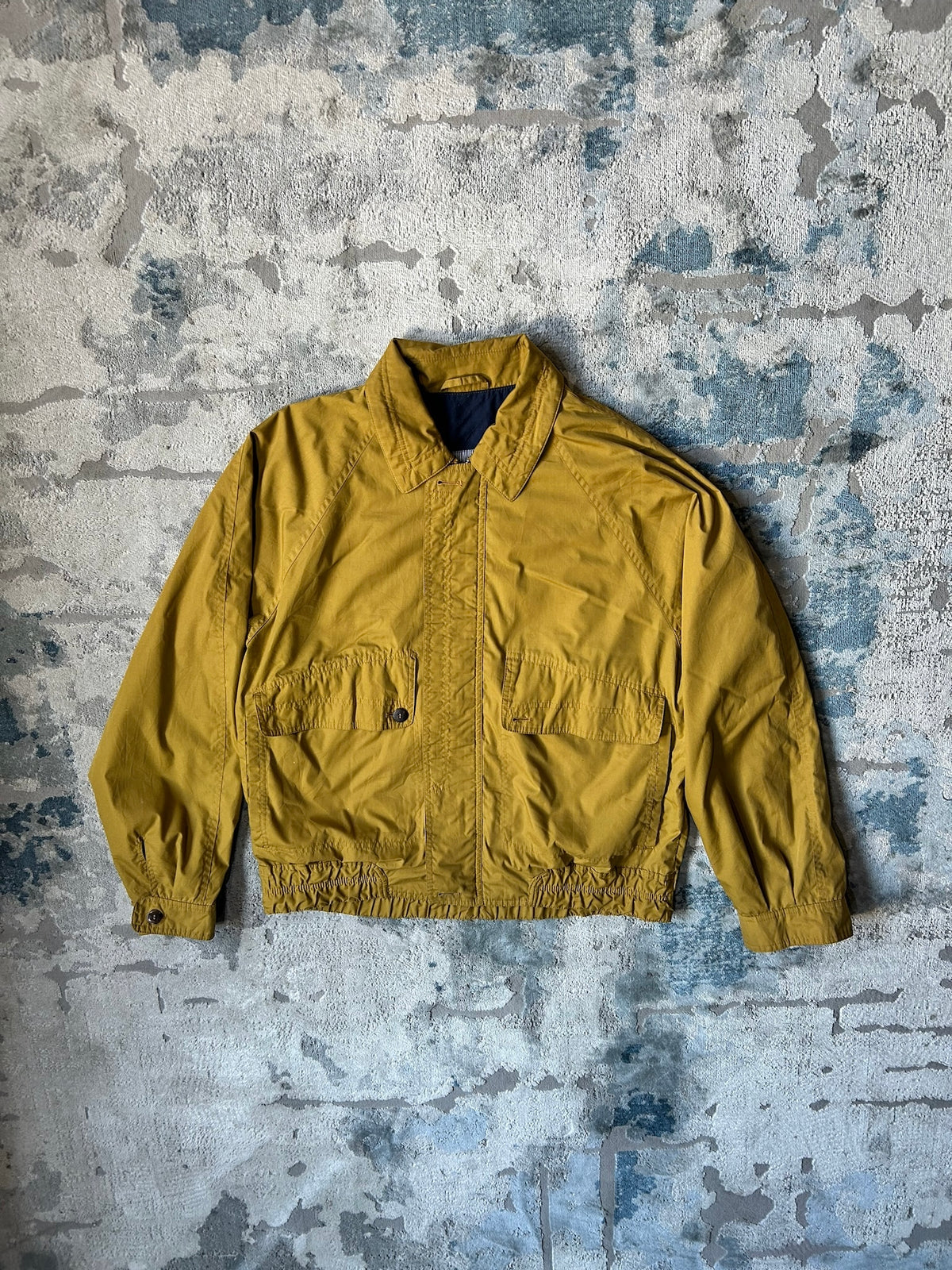 Mustard windbreaker jacket