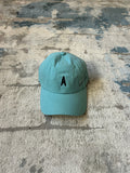 Turquoise baseball cap
